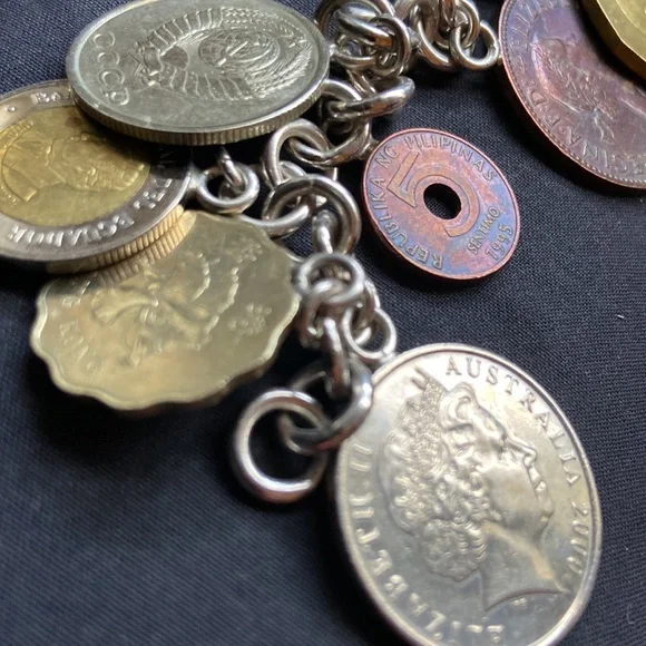 925 sterling silver coin charm bracelet 11 of them on here milor bracelet